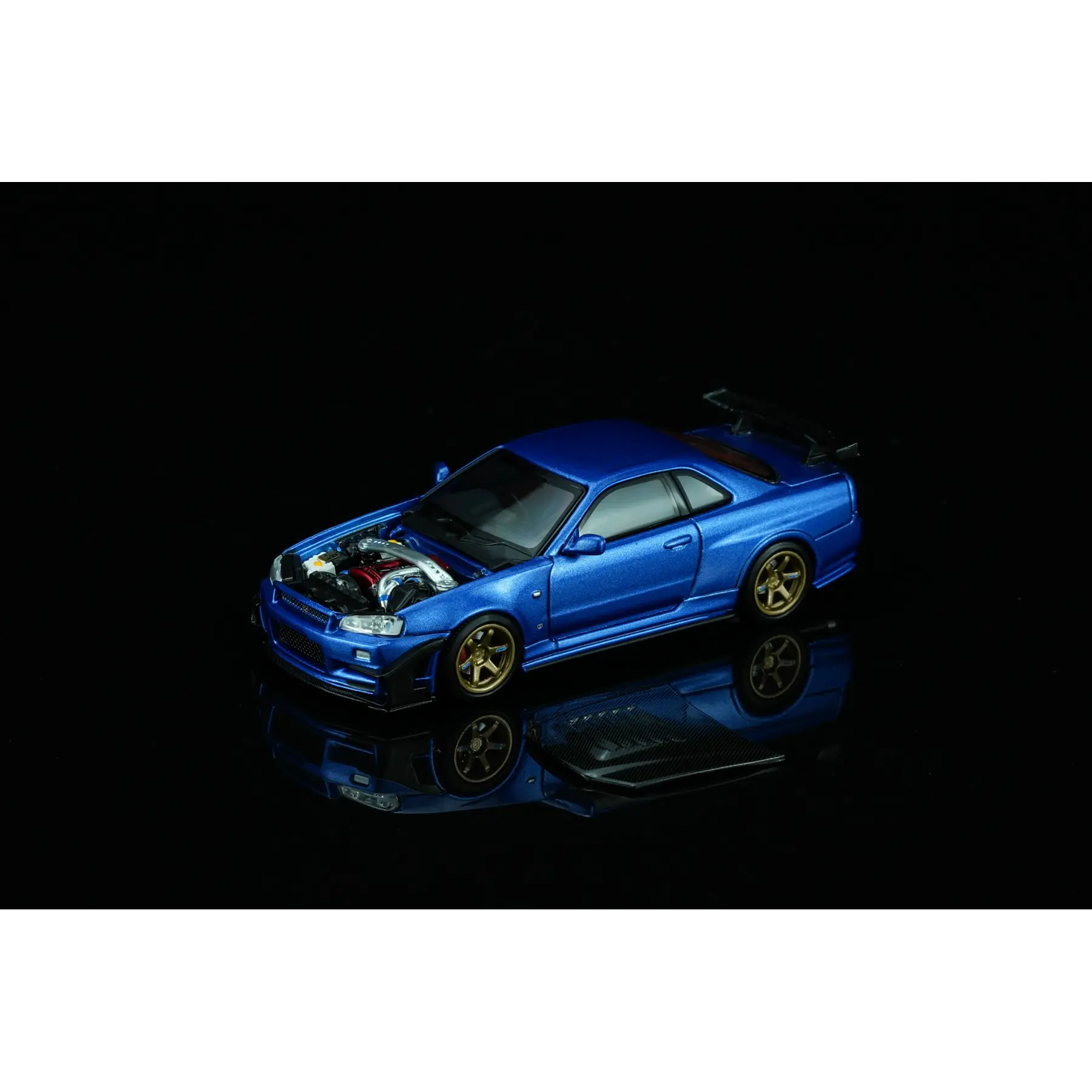 (PREVENTA) Motorhelix 1:64 Nissan Skyline GT-R (R34) Custom Edition - Wangan Blue Custom with GT Aero Kit