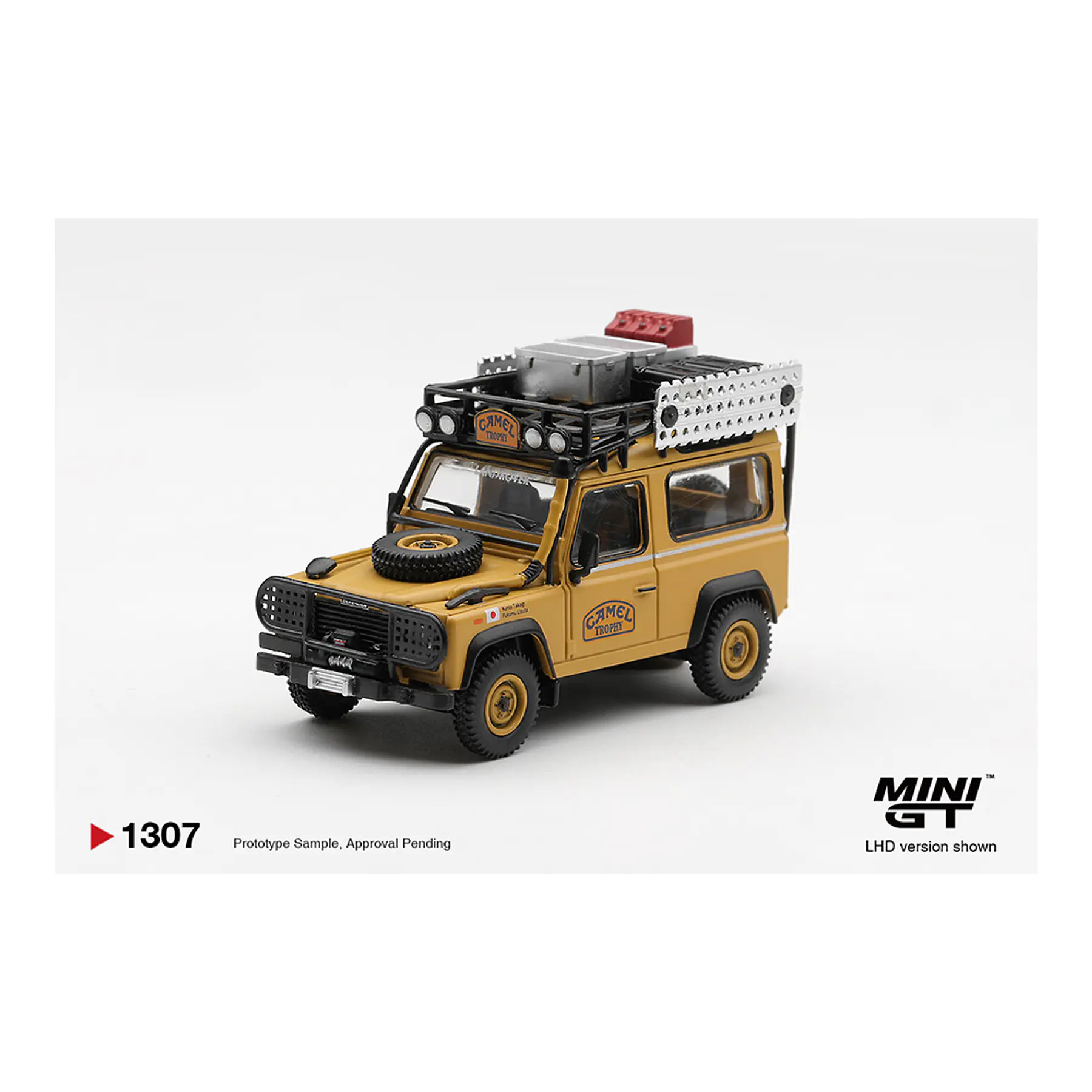 (PREVENTA) Mini GT 1:64 #1307 Land Rover Defender 90 1985 Camel Trophy Borneo Team Japan
