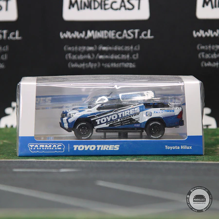 Tarmac Works 1:64 Toyota Hilux TOYO Tires – Blue with Graphics – Hobby64