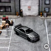 Mini GT 1:64 Nissan Skyline GT-R Dark Metal Gray (NISMO BNR34 CRS Version). 