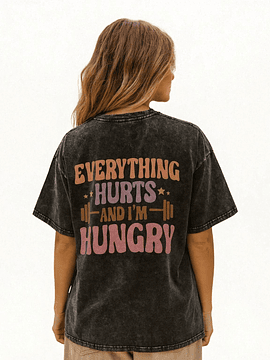 POLERA OVERSIZE - EVERYTHING HURTS NEGRA COLORES
