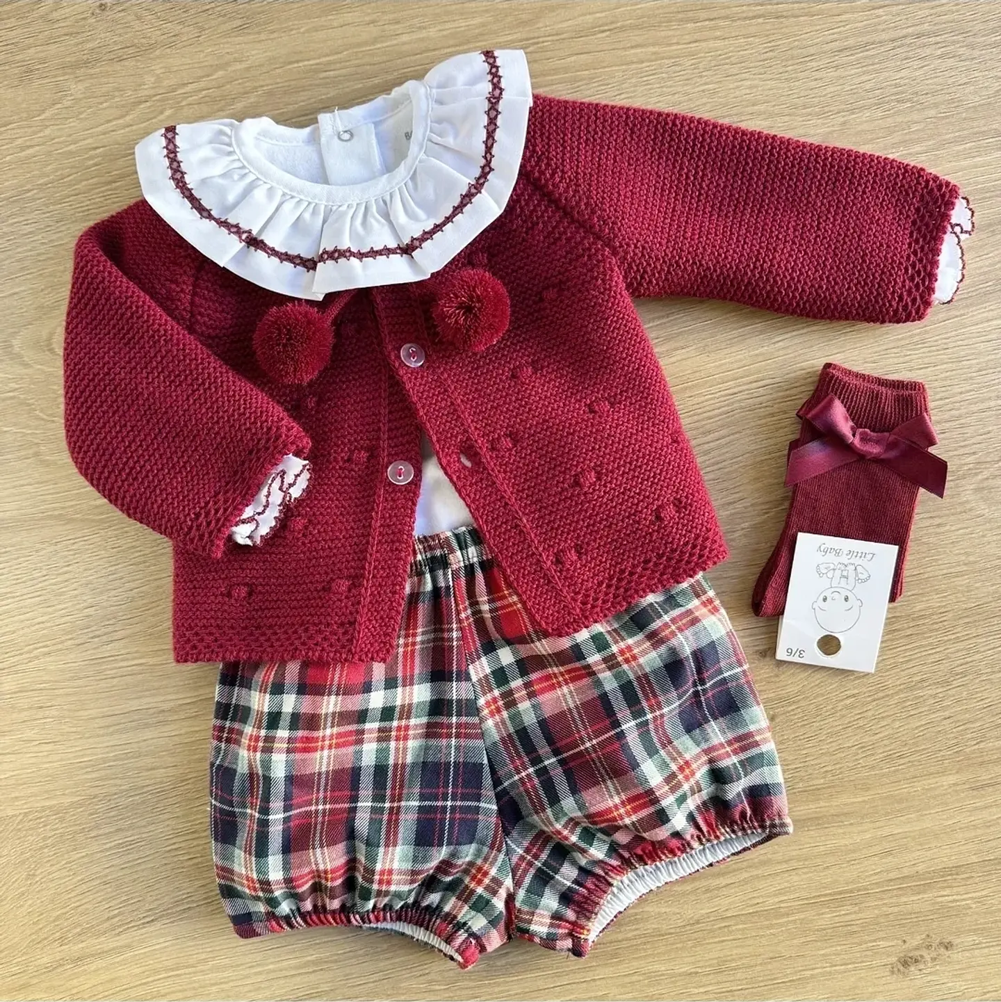 Conjunto de calções e casaquinho 7