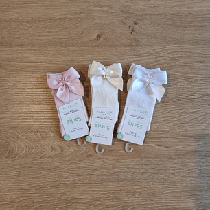 Meias pelo joelho com laço