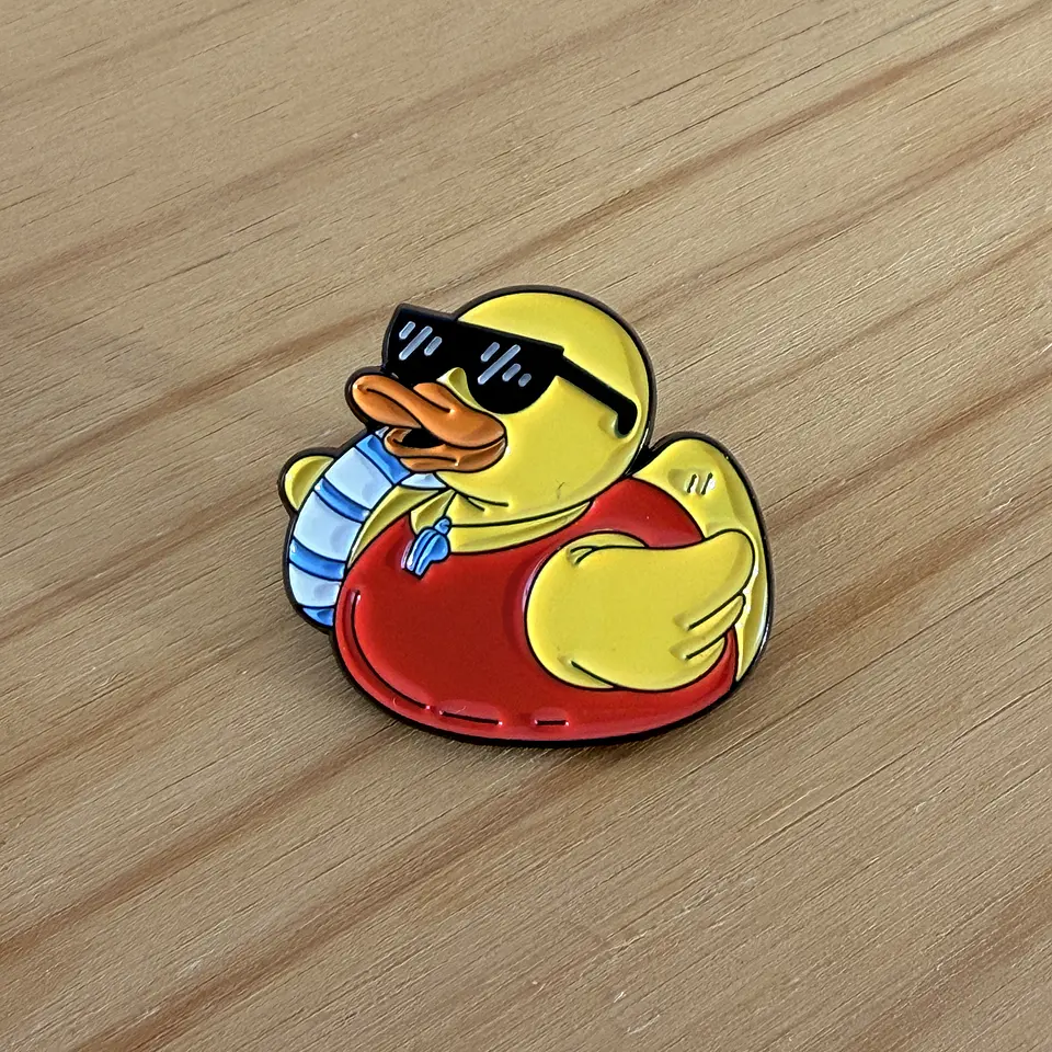 Pin metálico Pato Nadador 1