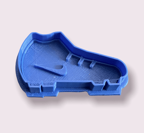 Cortador y marcador zapato de futbol