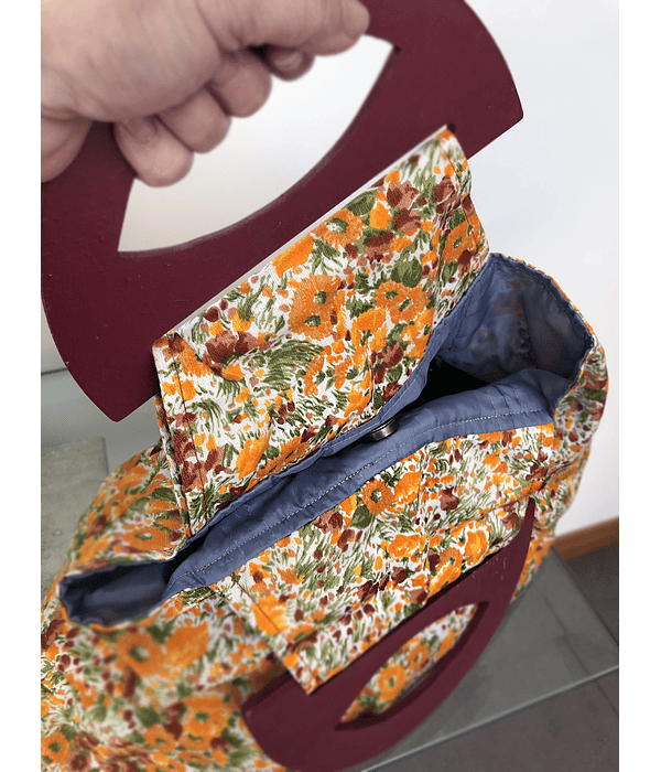 Bolso con manillas