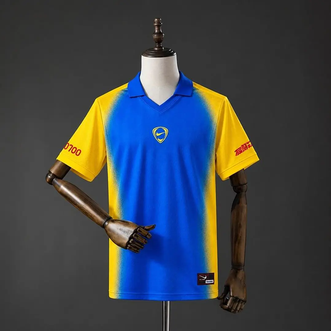 CAMISA COLÔMBIA TOTAL 90 TRAVIS SCOTT x NIKE RETRÔ, Azul e amarela 1