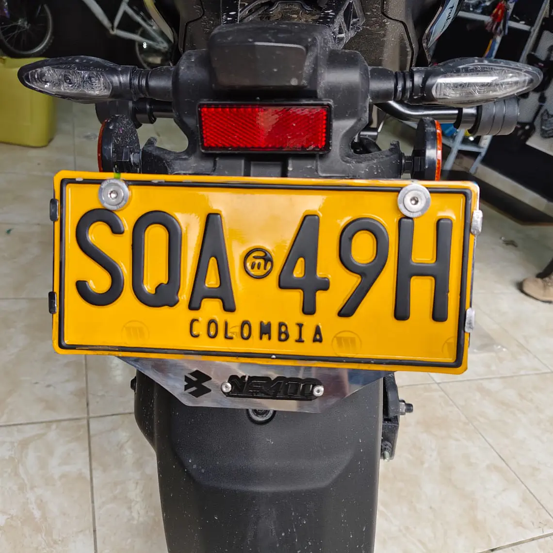 Porta Placa 4