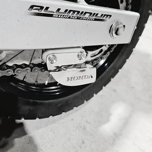 LATERAL PATIN TENSOR CADENA XRE 300
