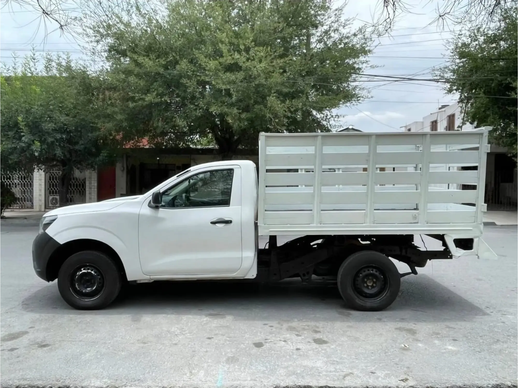 NISSAN NP300 2.5 ESTACAS DH AA MT 2018  8