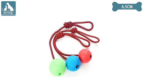 Juguete pelota de goma con cuerda 6.5cm color aleatorio