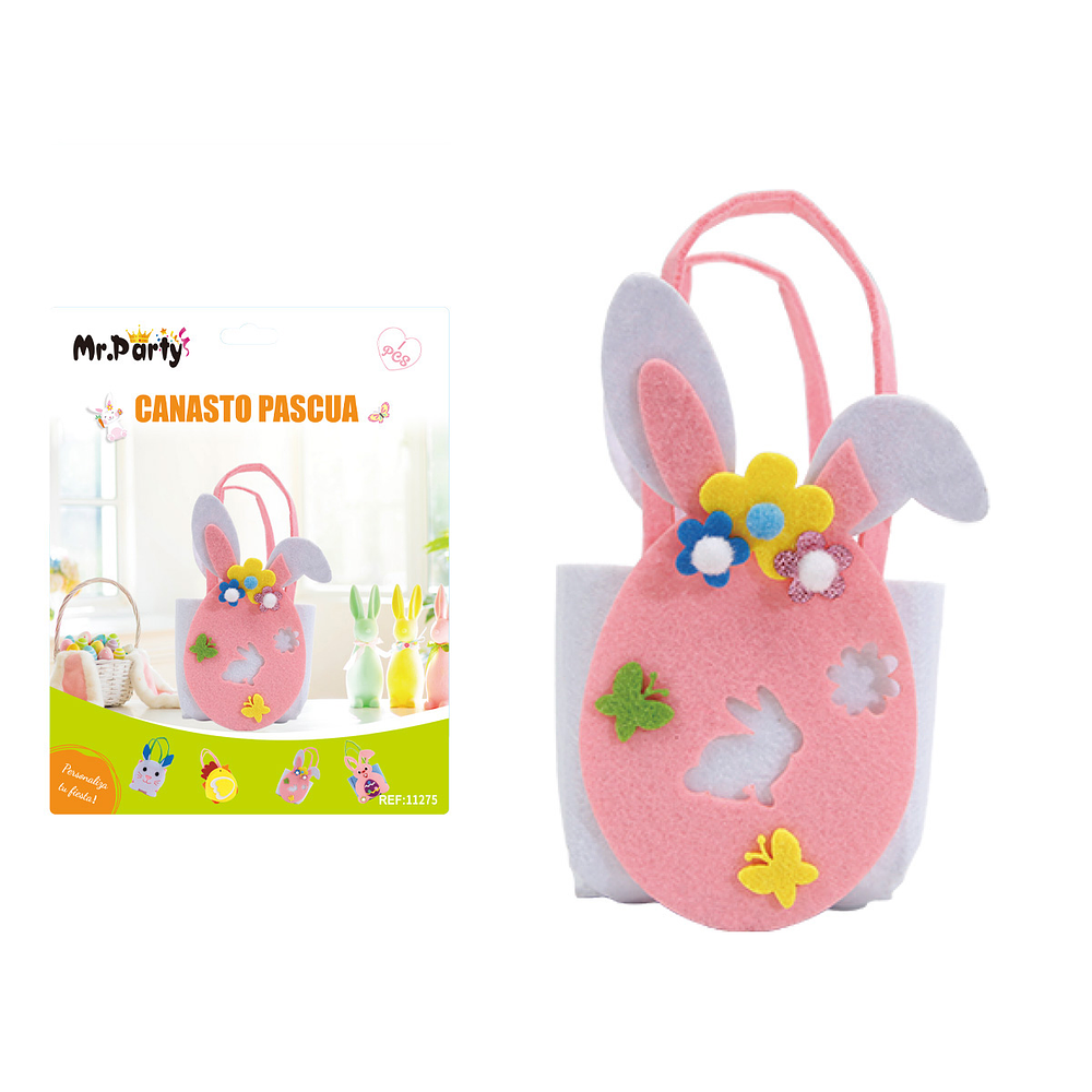 Canasta de Pascua con orejas de conejo y huevo