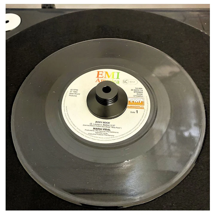 ADAPTADOR METALICO PARA VINILOS 7