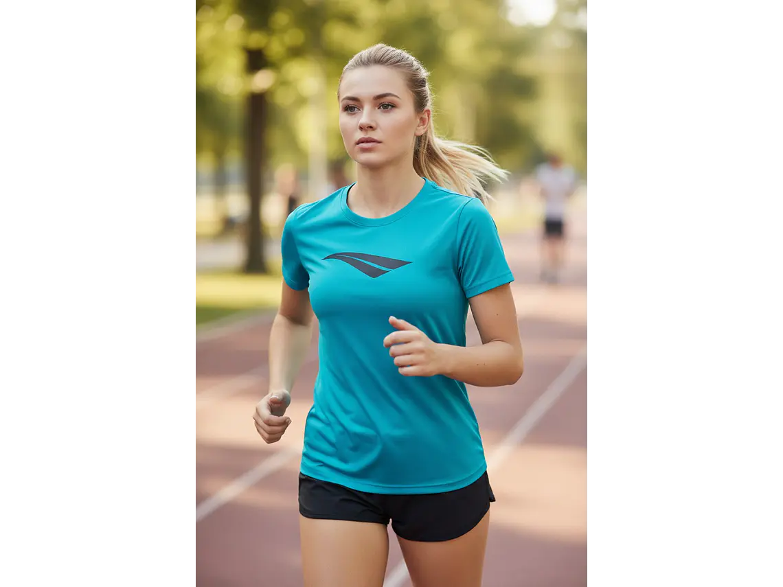 Polera Penalty Logomania Turquesa  3