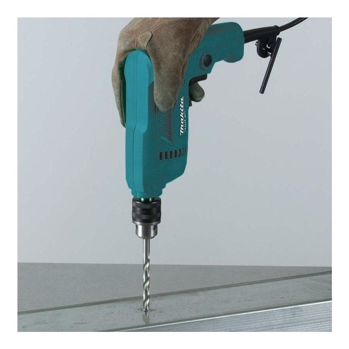 Taladro Rotativo Makita Mt De 3/8 350w M0600b 2