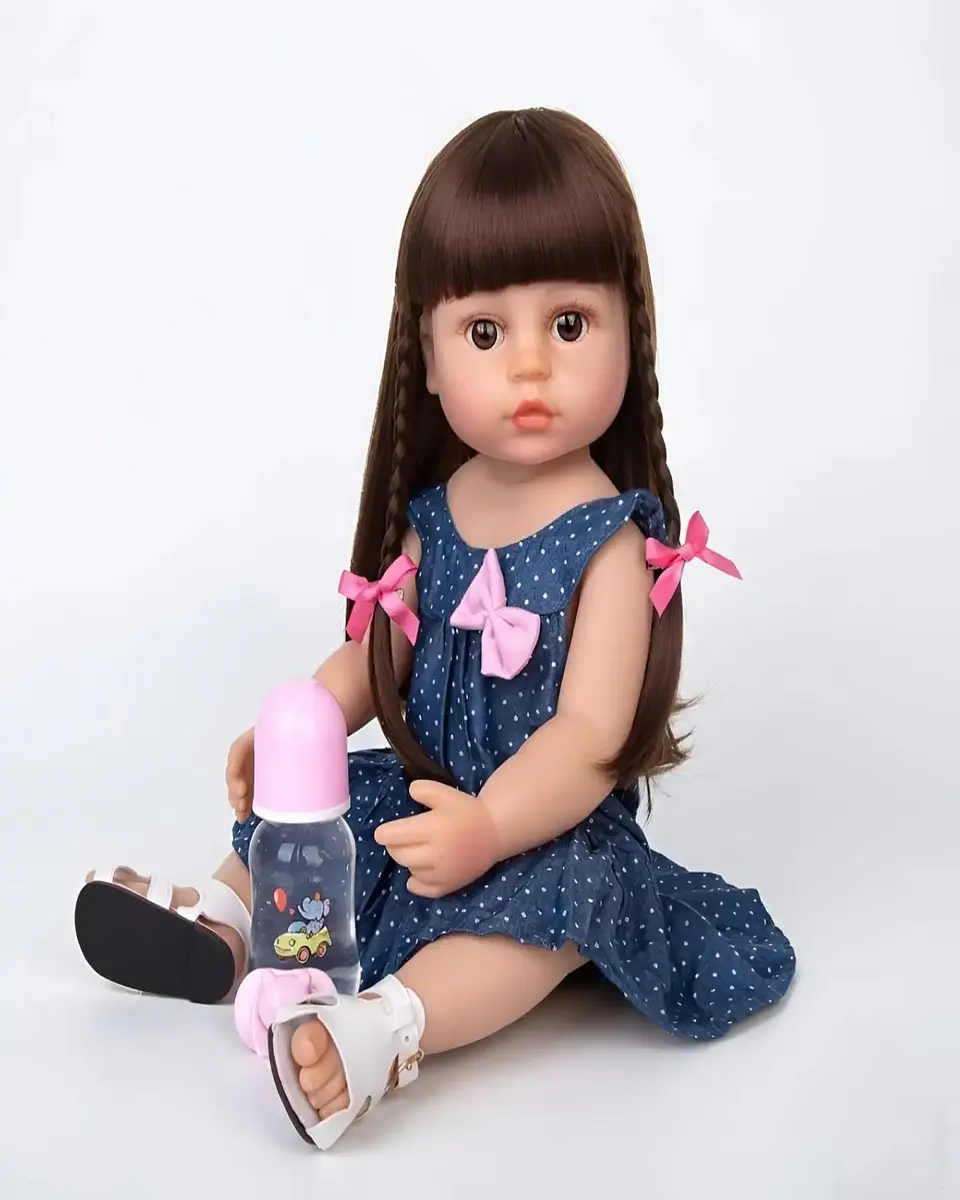 Muñeca Reborn Realista con Accesorios - Vestido Azul y Trenzas 6
