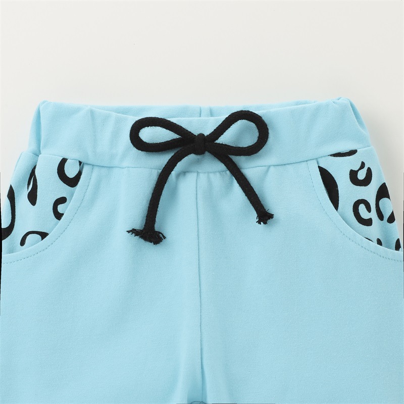 Animal print celeste | Conjunto poleron, pantalones y cintillo 3