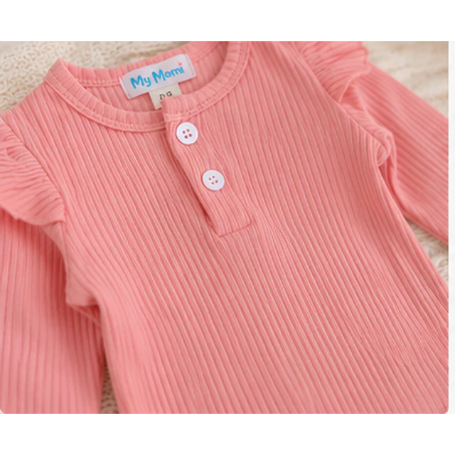 Conjunto pilucho, pantalones y cintillo flores rosadas