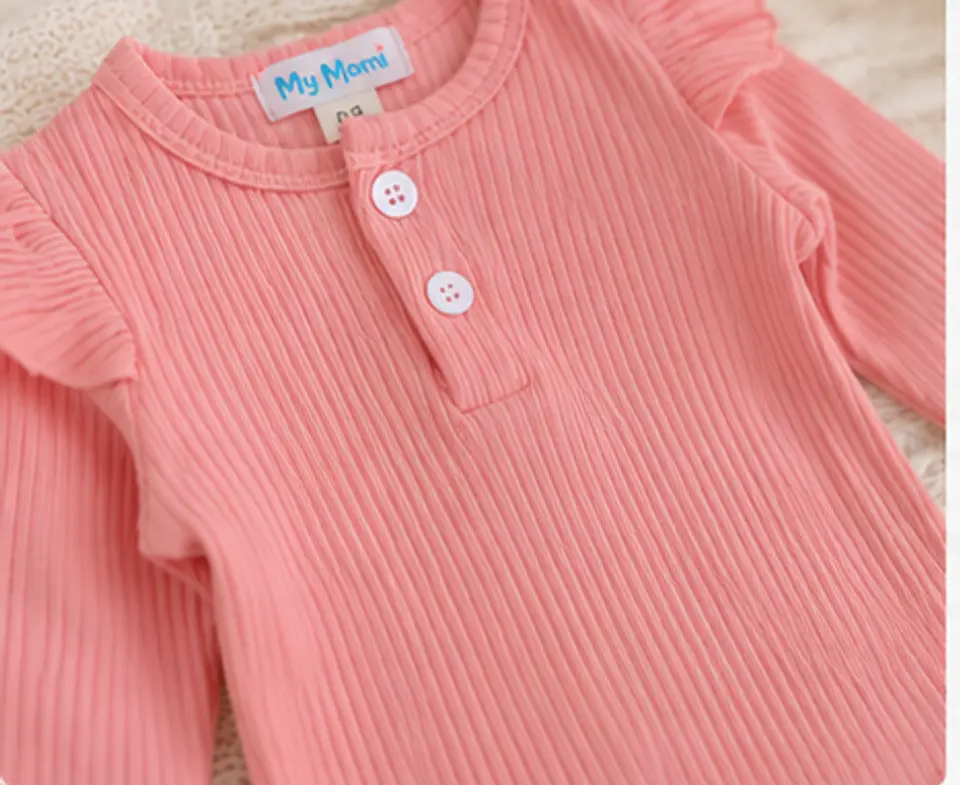 Conjunto pilucho, pantalones y cintillo flores rosadas 4