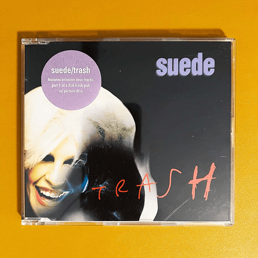 Suede - Trash (Con sticker)