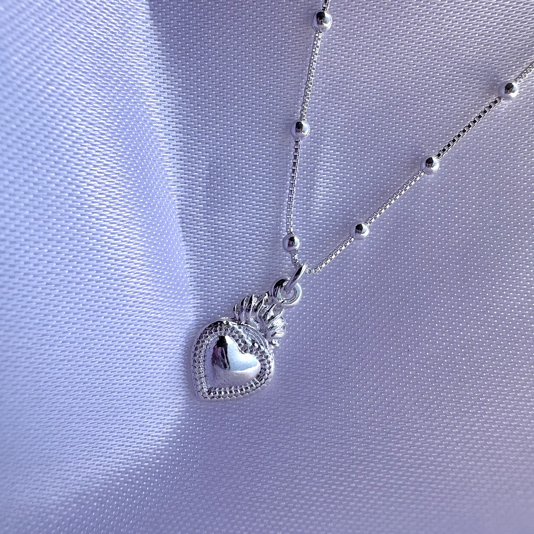 Cadena con corazon detente 1