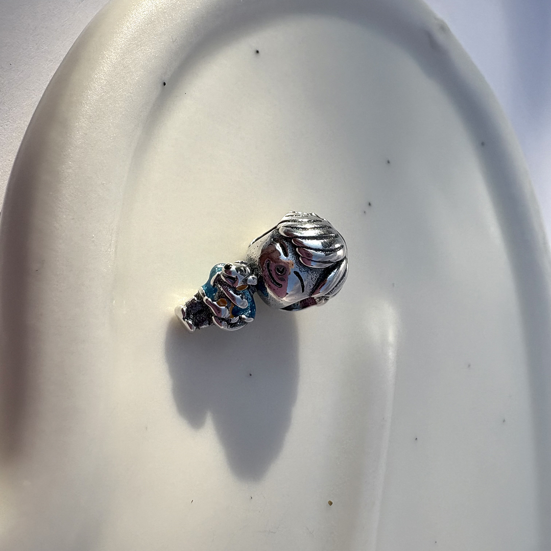 Charms Niño con mascota 2