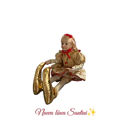 Muñeca coleccionable dorado con rojo