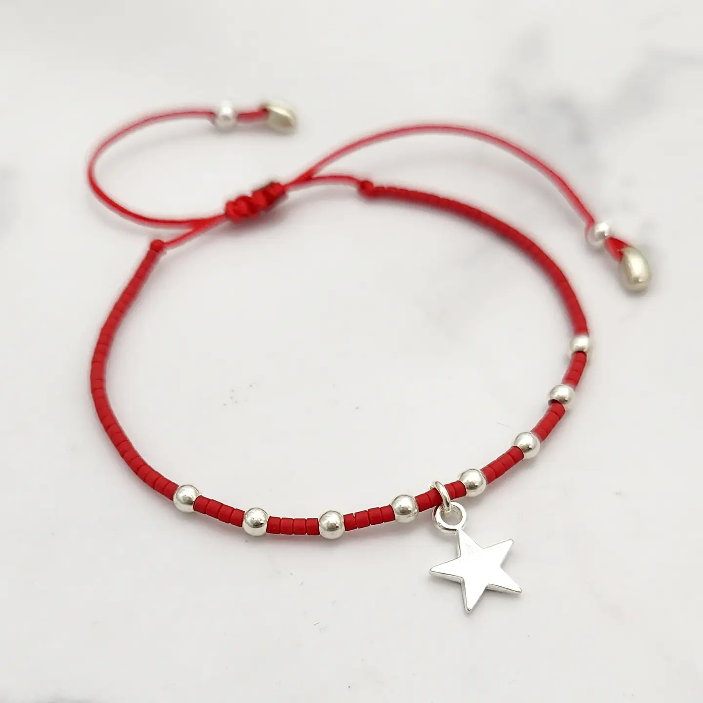 Macramé Estrella Pelotitas Roja 1