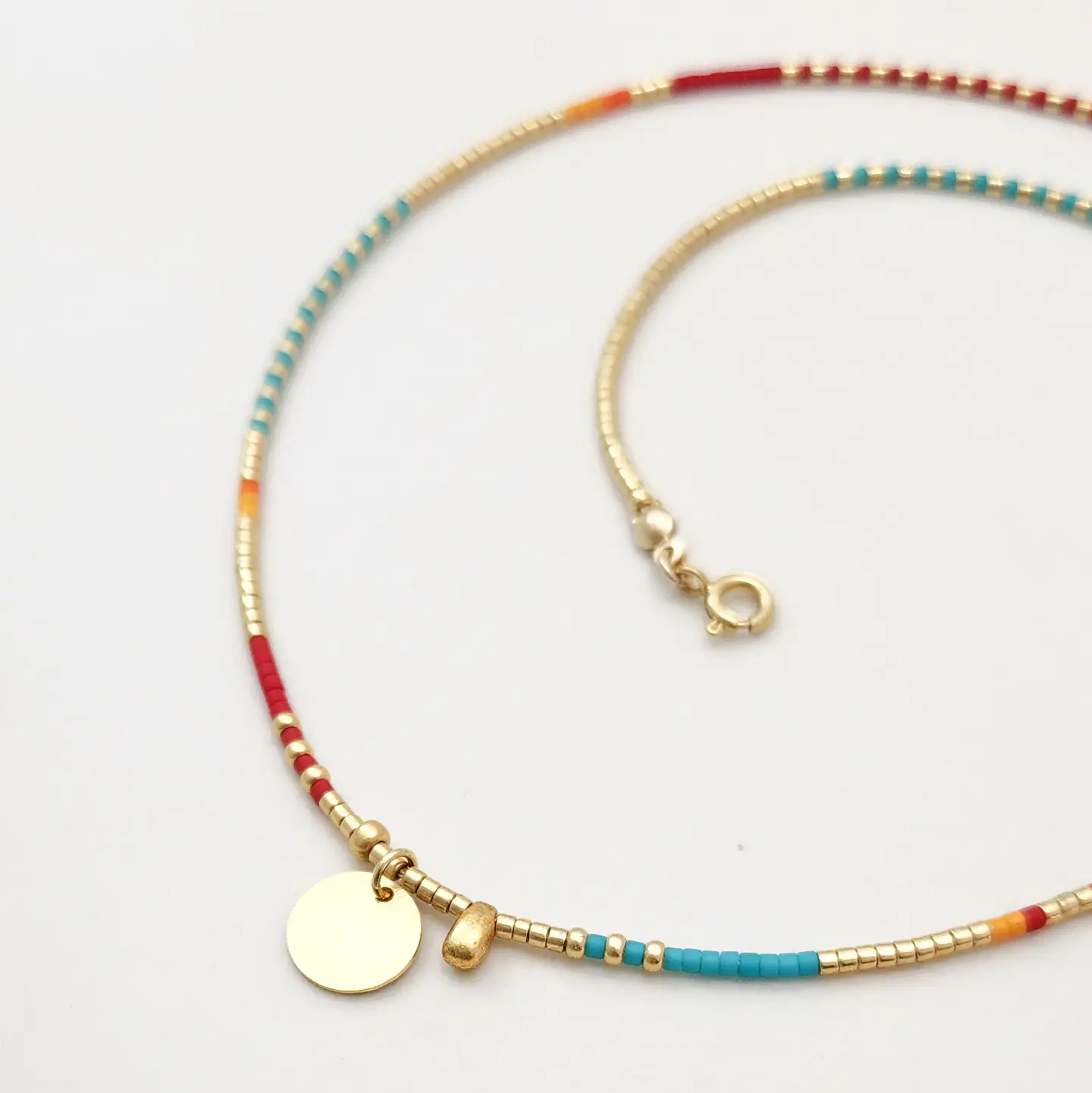 Collar Trama Rojo Turquesa 1