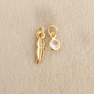 Dijecitos Pluma y circón Baño de Oro