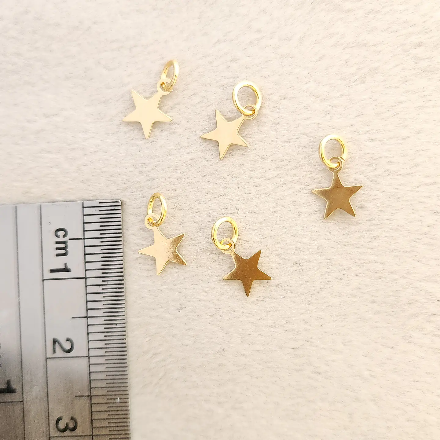 Pack 5 estrellas bañadas en oro 2