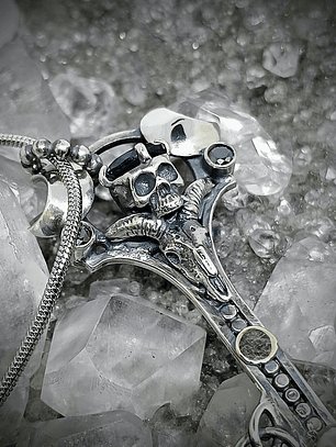 Goat and humanoid skull key #2