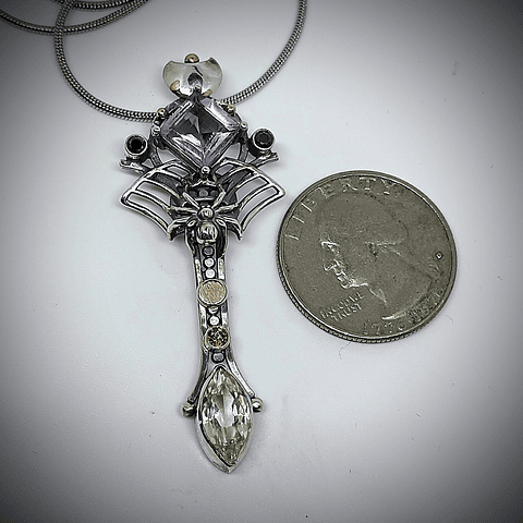 Amethyst and green spinel spiderweb key pendent