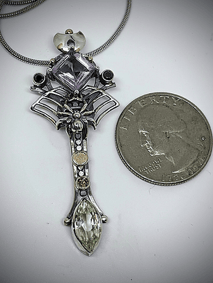 Amethyst and green spinel spiderweb key pendent