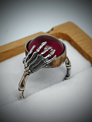 Gothic skeleton hand and ruby ring
