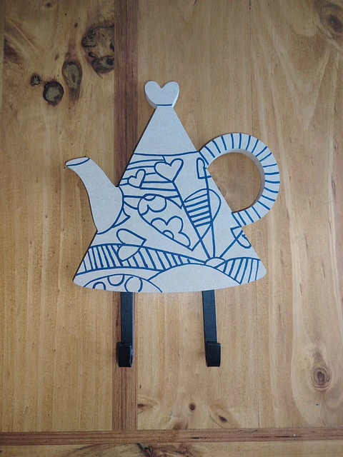 PERCHERO TETERA ROMERO BRITO