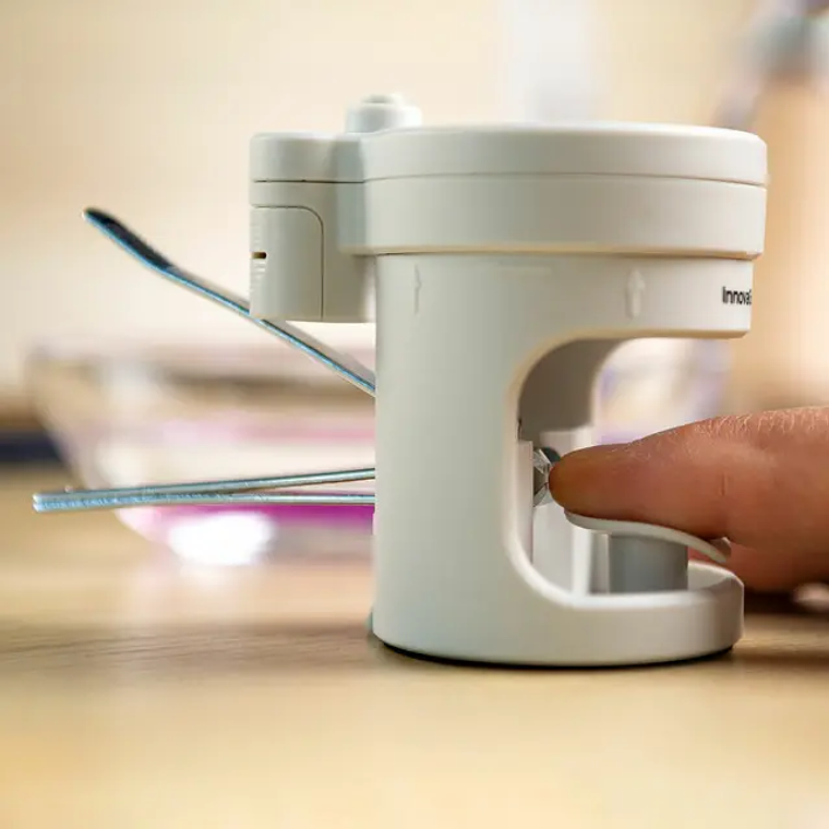 Nail clipper with LED light and 8x magnifying glass - Includes nail file, non-slip base, and battery/USB powered. 5