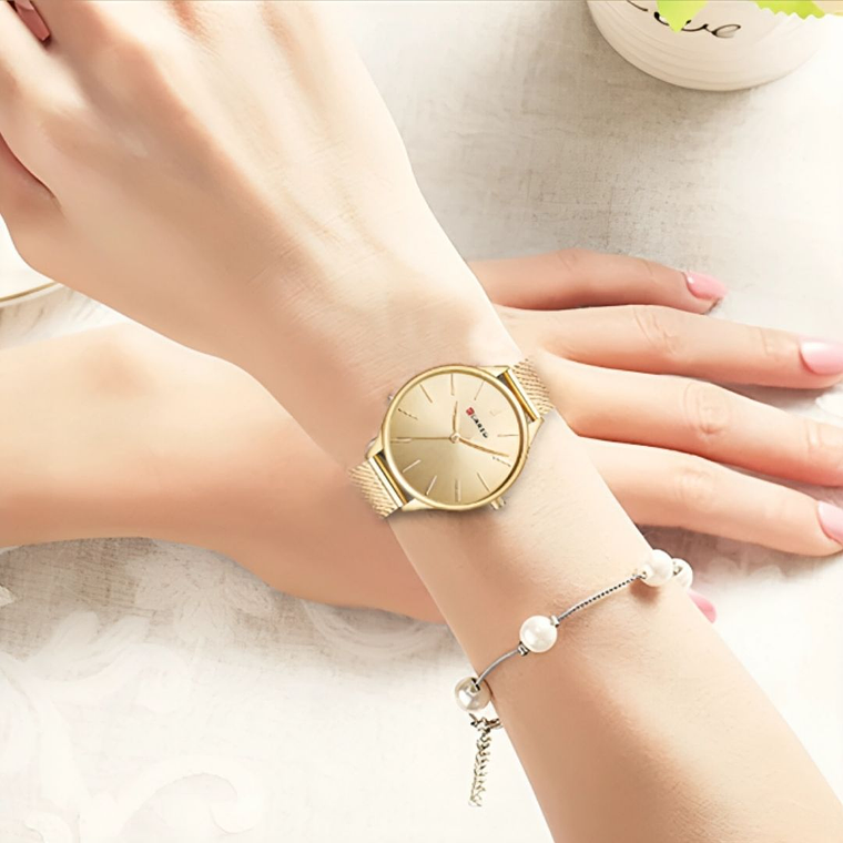 Reloj Análogo Curren Original KREb7318 para Mujer Acero Color Dorado 3