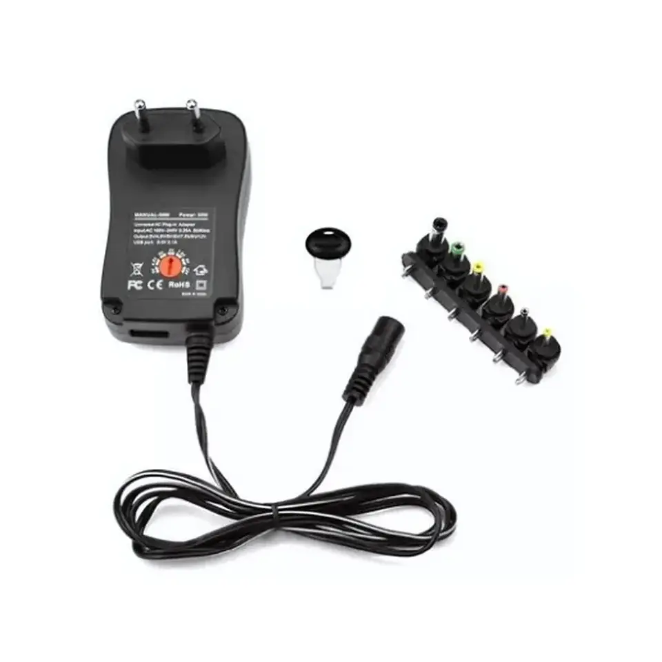 Adaptador De Energía universal  4
