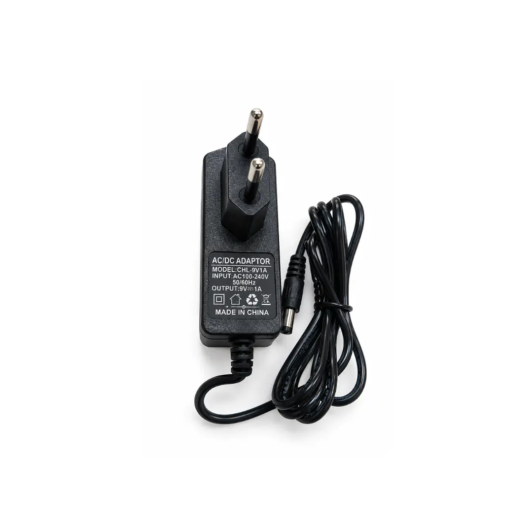 Fuente de poder  9v 1A central negativo  1