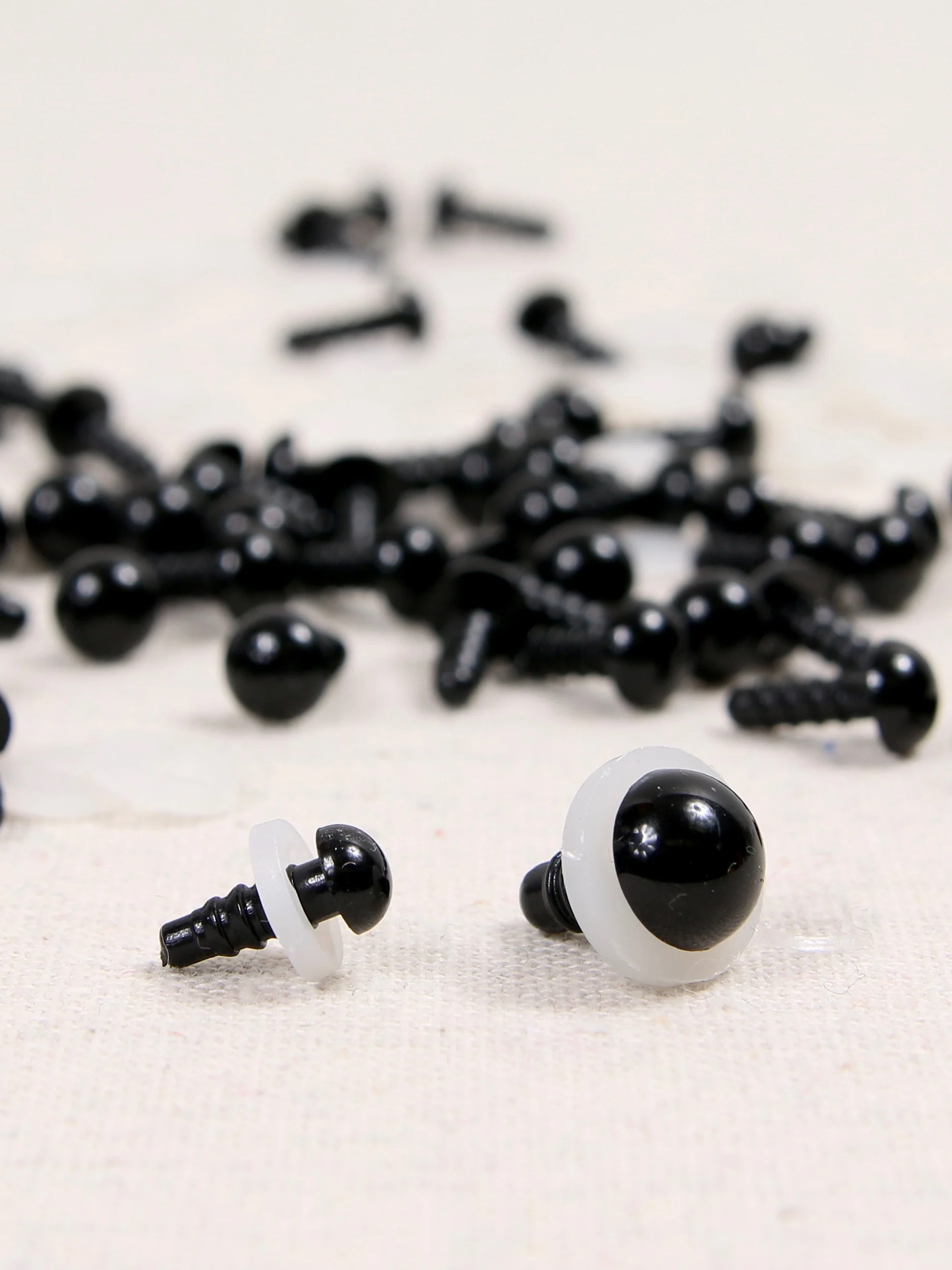 Olhos pretos + travas de segurança 10mm (embalagem)   1