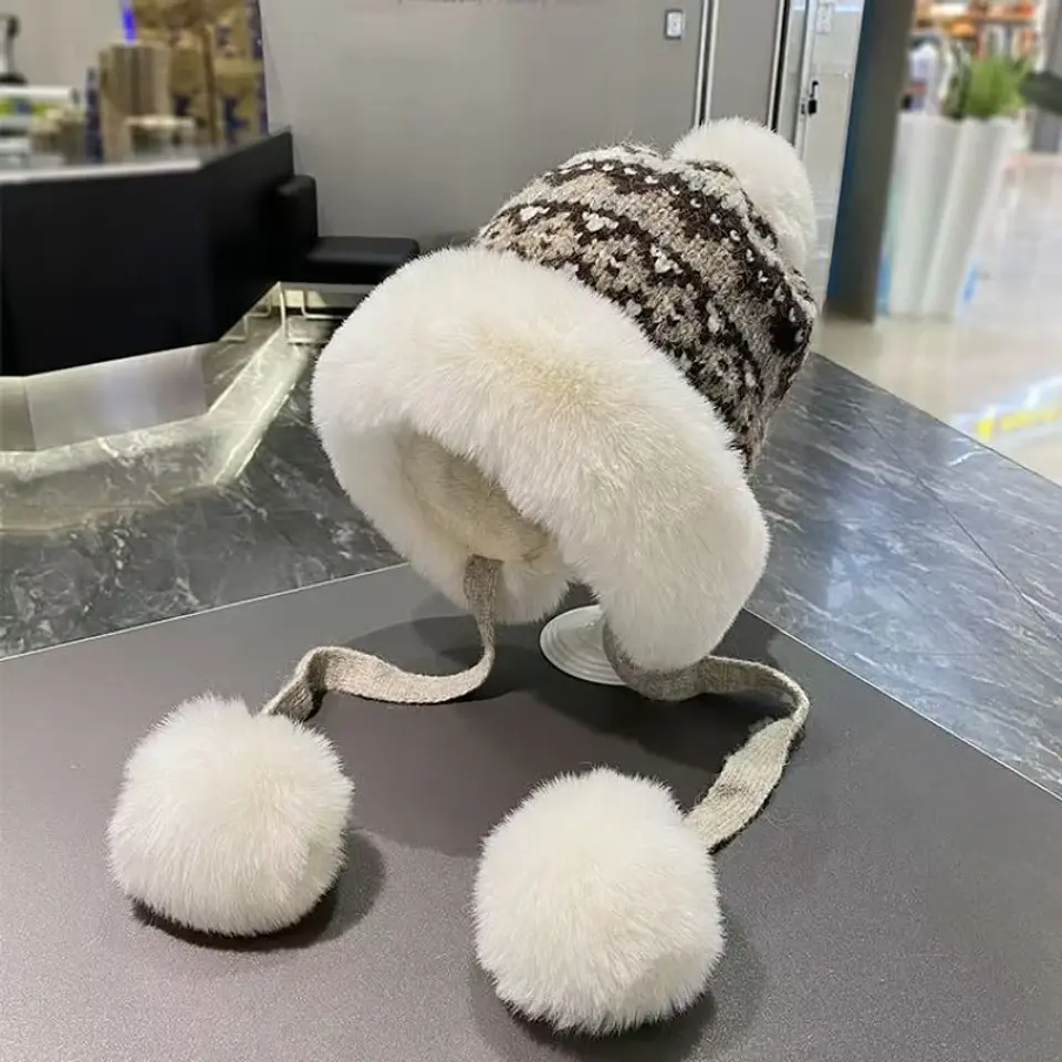 Gorro de invierno tejido con orejeras y pompón unisex 7