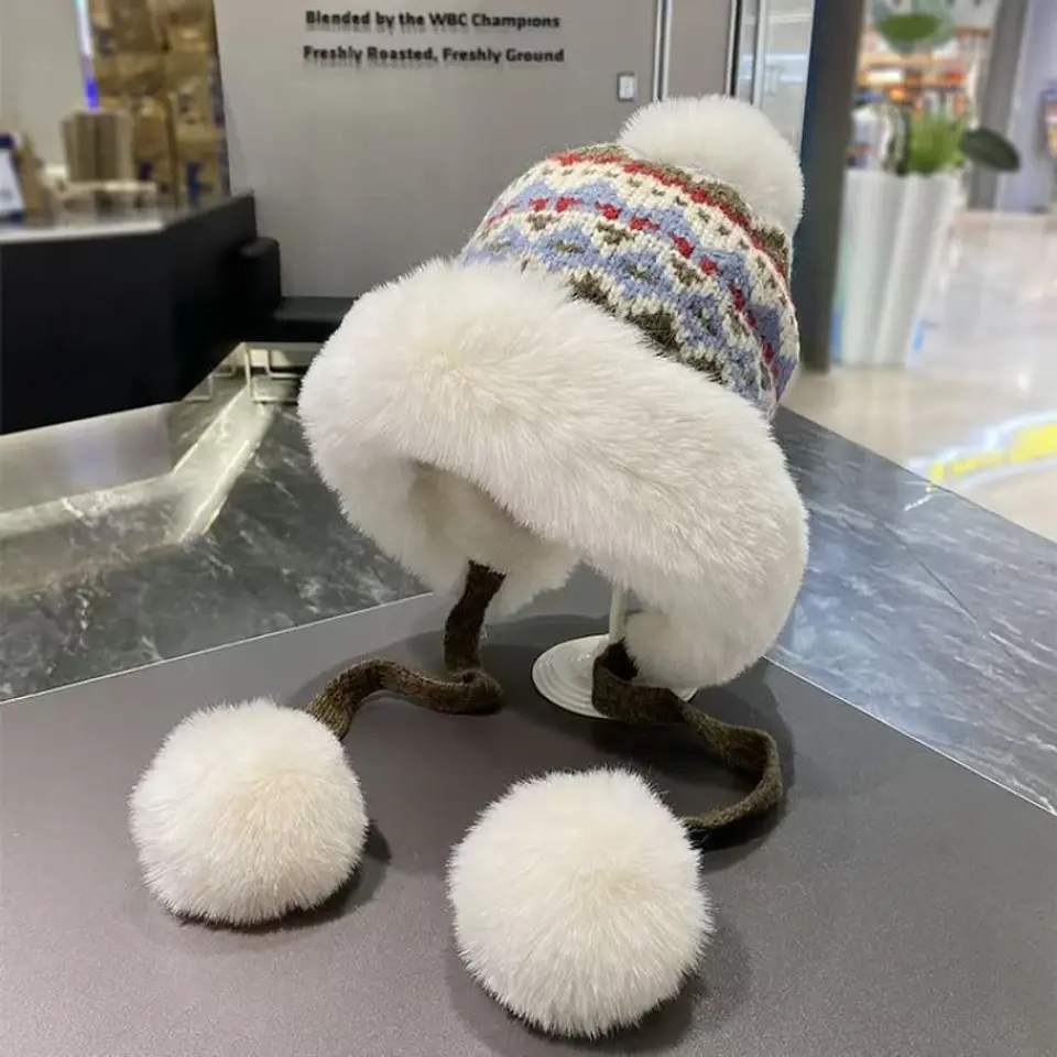 Gorro de invierno tejido con orejeras y pompón unisex 9