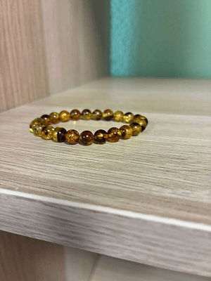 Puls. Âmbar criança