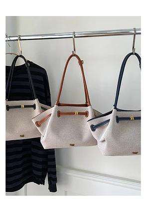 Bolso tote de lona con ribetes de cuero sintético y cierre de cremallera — estilo urbano minimalista