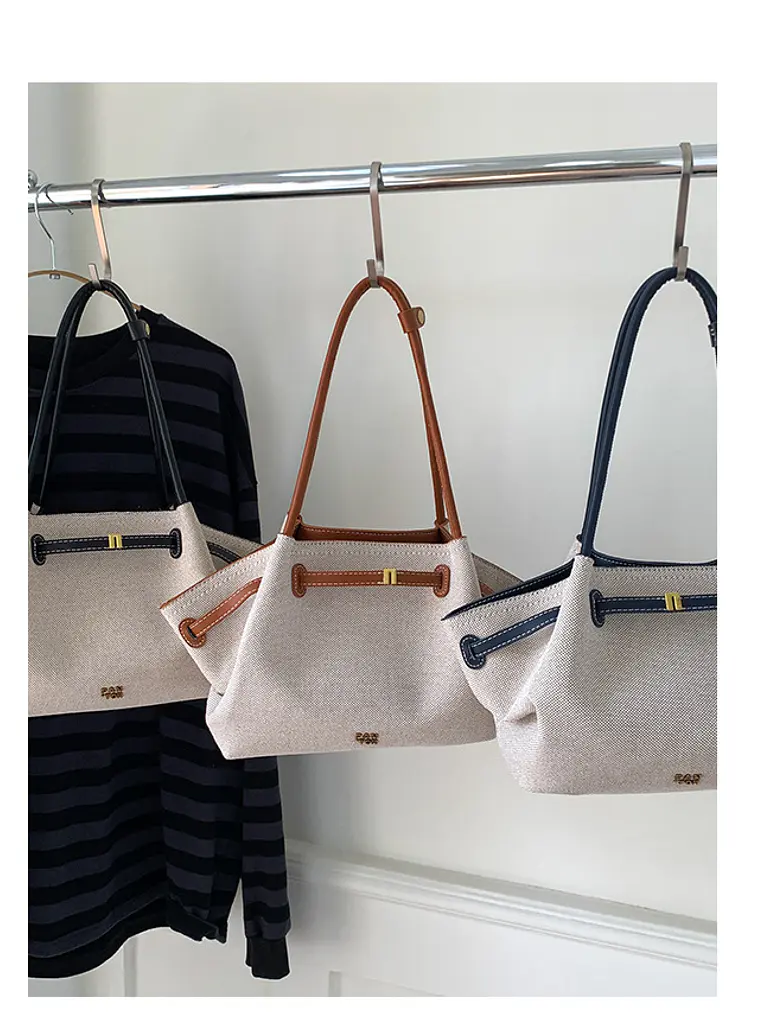 Bolso tote de lona con ribetes de cuero sintético y cierre de cremallera — estilo urbano minimalista 1