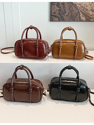 Bolso Boston mini con asas anudadas y correa larga — estilo retro street