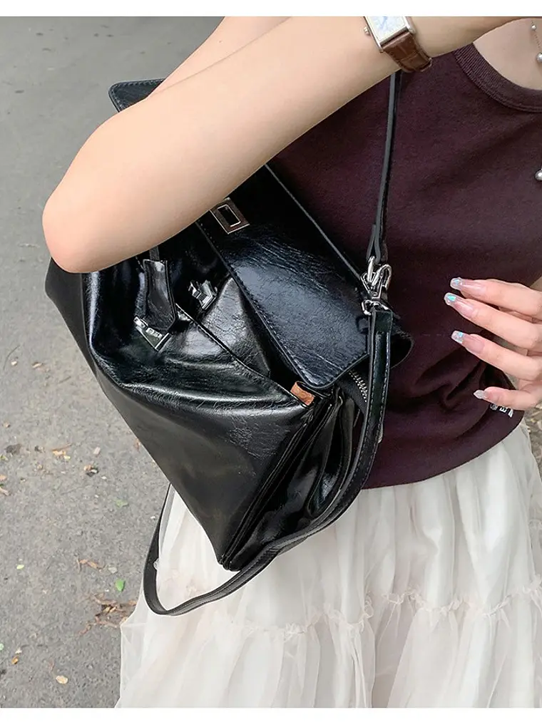 Bolso tipo Kelly de cuero sintético con cerradura giratoria — estructura clásica en dos tamaños 4
