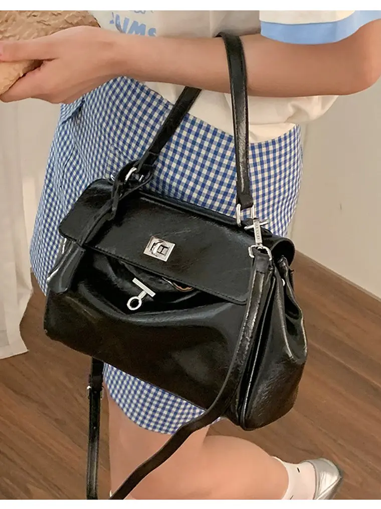 Bolso tipo Kelly de cuero sintético con cerradura giratoria — estructura clásica en dos tamaños 7