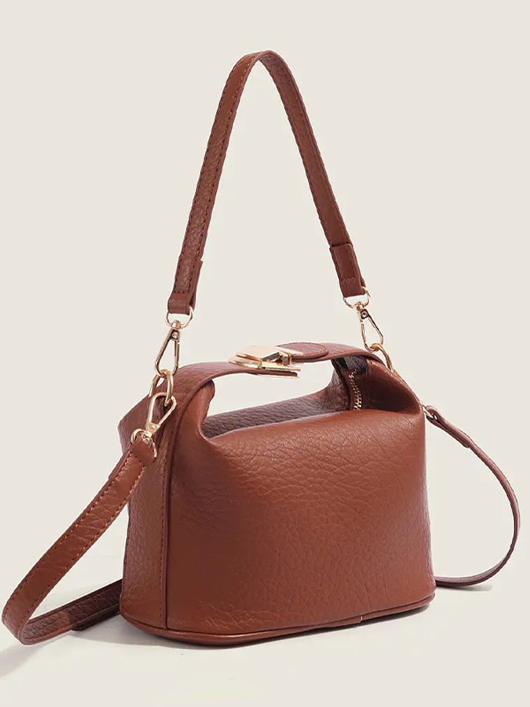 Bolso caja compacto de cuero sintético con asa giratoria dorada — estilo estructurado cotidiano 1